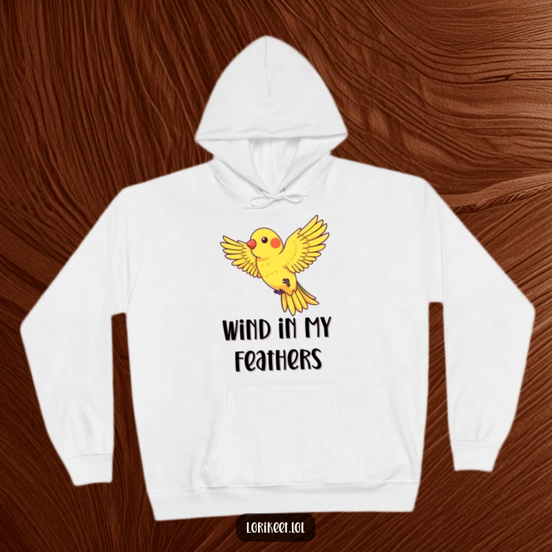 Funny Hoodie showing a lorikeet with outstretched wings playfully riding a gentle gust of wind, cozy and humorous.